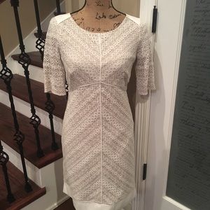 Cream colored fully lined lace dress.